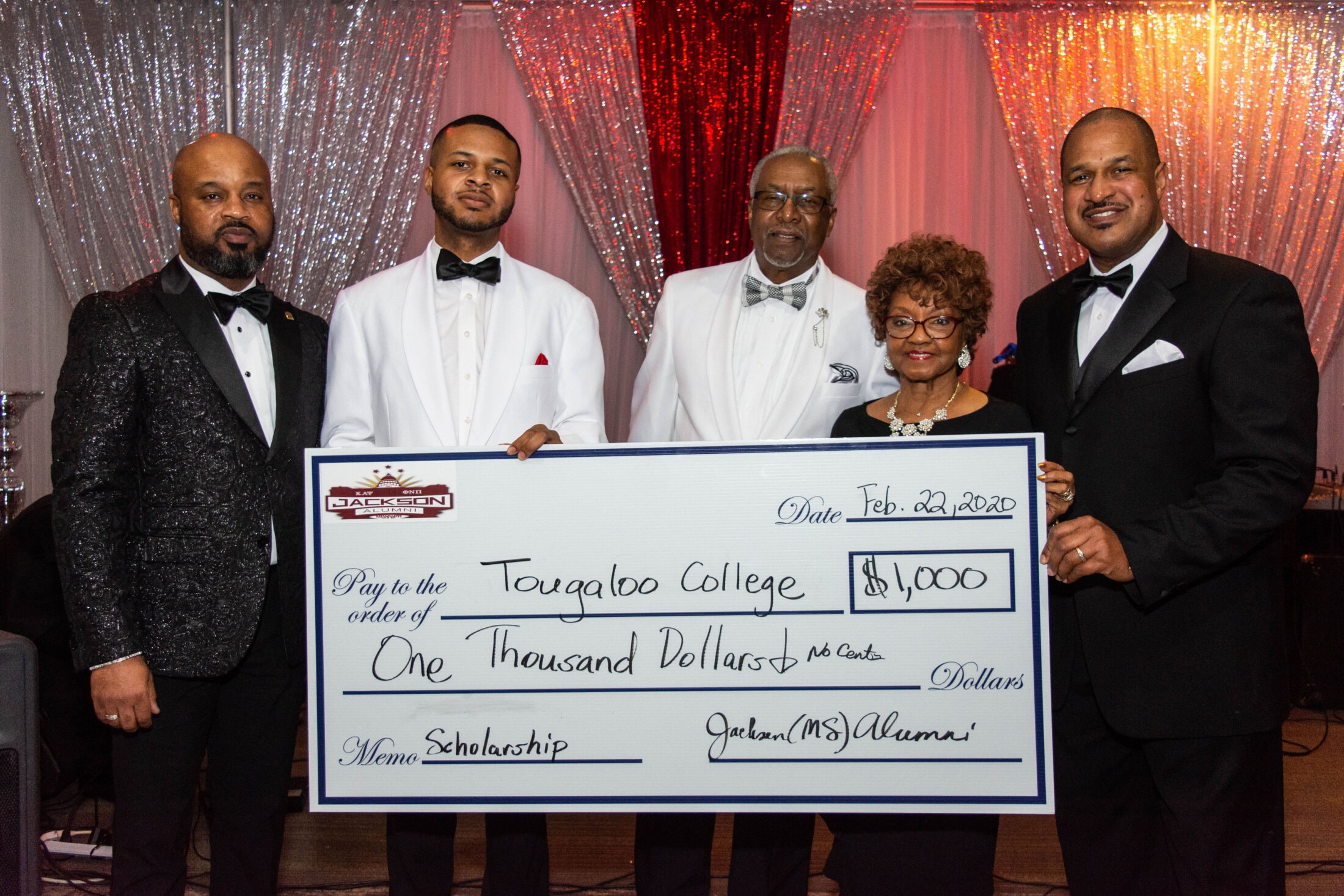 Chapter presenting scholarship check to Tougaloo College