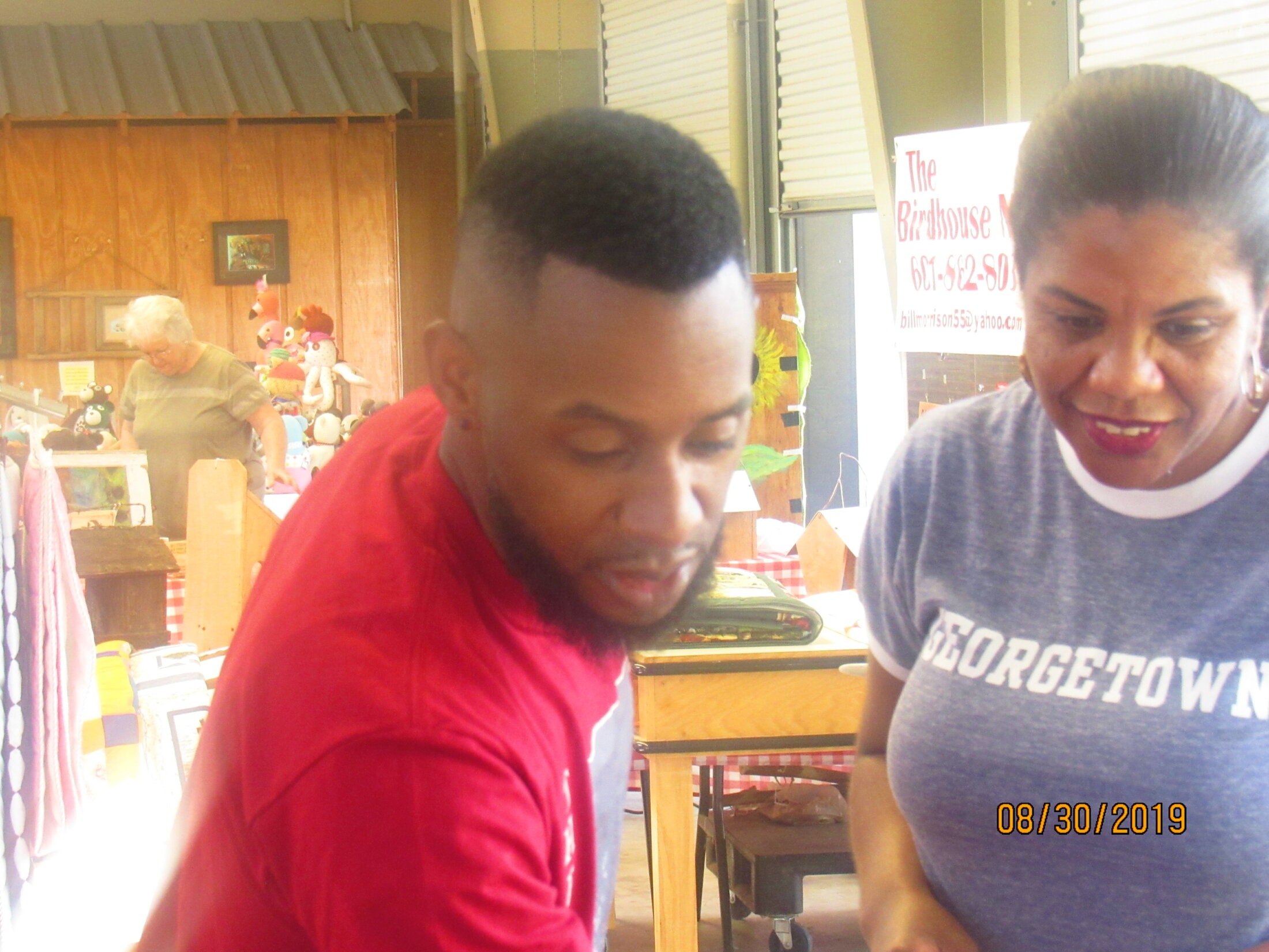 Brother at Farmers Market community health and nutrition event